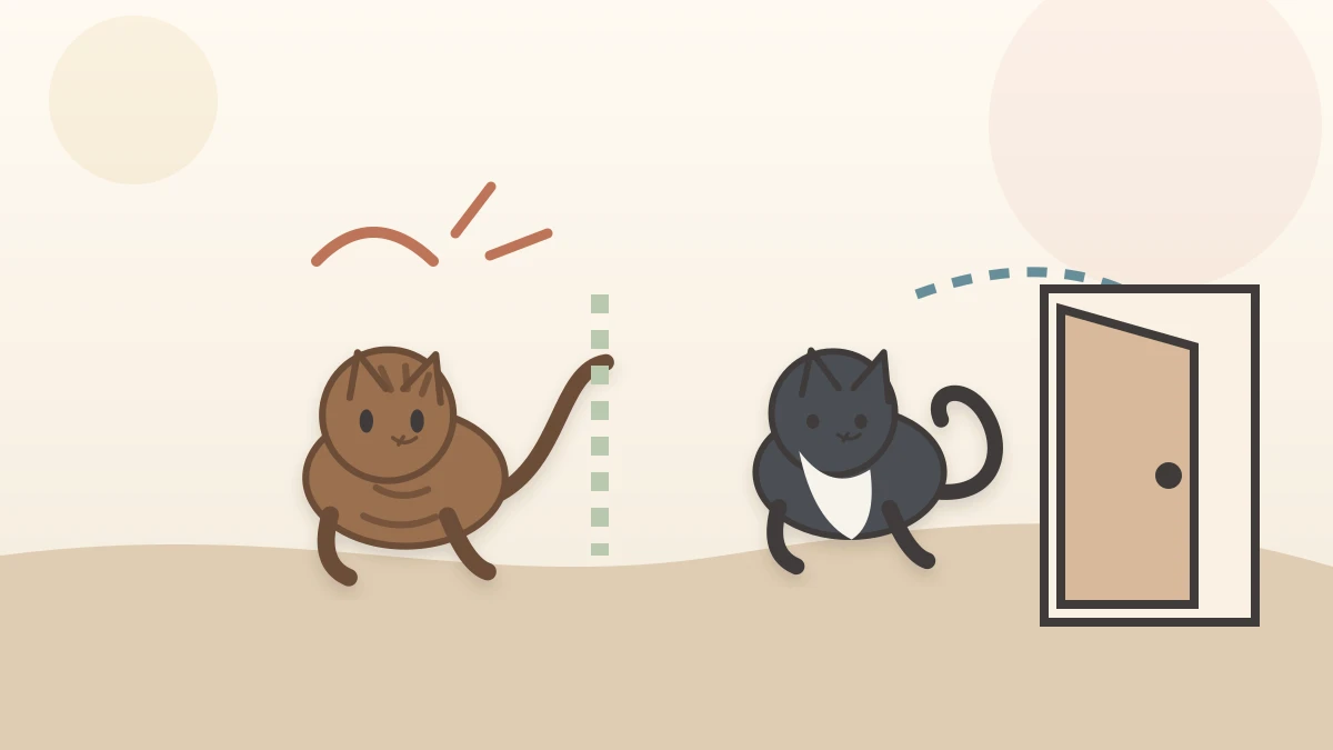 One cat gives a brief boundary signal while the other turns away and leaves an open retreat path